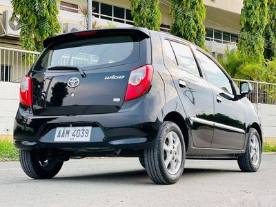 Black Toyota Wigo 2014 for sale in Noveleta