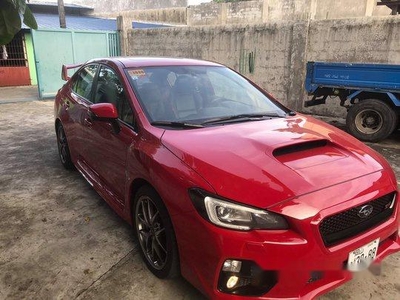 Red Subaru Wrx 2015 at 21000 km for sale