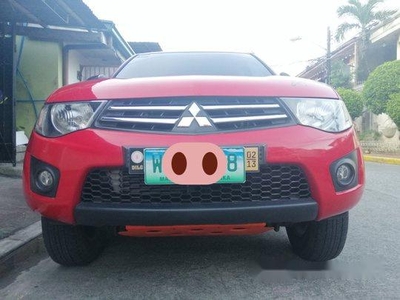 Sell Red 2013 Mitsubishi Strada in Quezon City