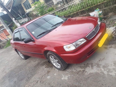 Sell Red Toyota Corolla in Quezon City