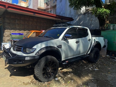 Sell White 2014 Mitsubishi Strada in Manila