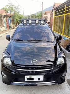 Selling Black Toyota Wigo 2014 in Manila