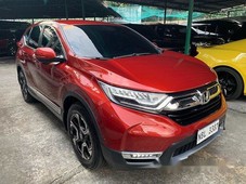 selling red honda cr-v 2018 at 12000 km