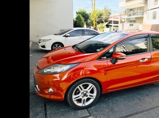 Orange Ford Fiesta 2013 Hatchback for sale in Quezon City