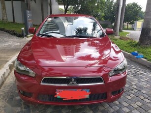 Red Mitsubishi Lancer 2013 for sale in Quezon City