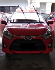 Red Toyota Wigo for sale in Valenzuela