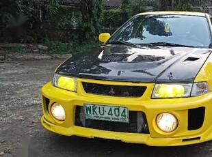 Selling Yellow Mitsubishi Lancer Evolution 1998 in Pasig