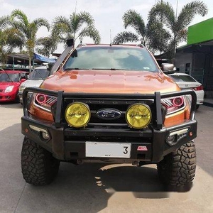 Orange Ford Ranger 2015 at 20000 km for sale