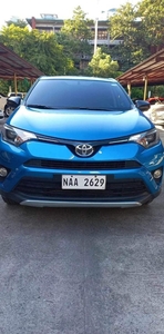 Selling White Toyota Rav4 2016 in Quezon City