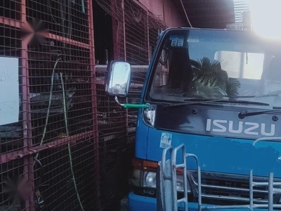 Blue Isuzu Elf for sale in Morong