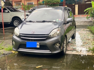 Sell White 2014 Toyota Wigo in Quezon City