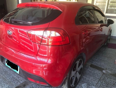 Selling Red Kia Rio in Angeles