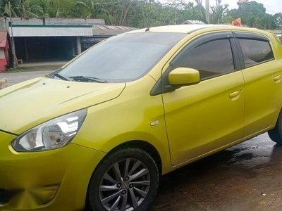 Selling Yellow Mitsubishi Mirage 2013 in Tabaco