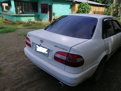 White Toyota Corolla 1999 for sale in Pinamungajan