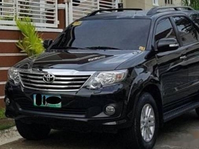 Black Toyota Fortuner 2013 SUV Automatic for sale in Manila