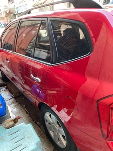 Red Kia Carens for sale in Quezon
