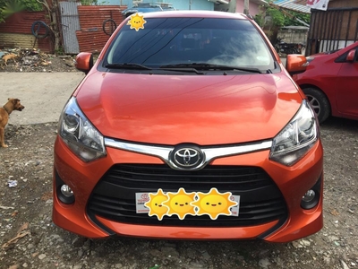 Selling Orange Toyota Wigo in Dasmariñas