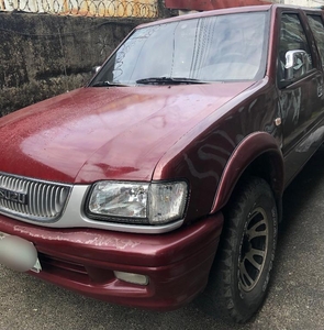 Selling Red Isuzu Fuego 2006 in Quezon