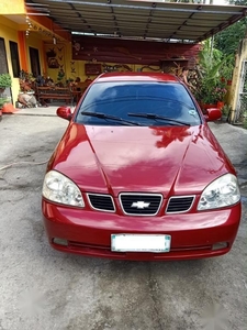 Red Chevrolet Optra 2004 for sale in Manual