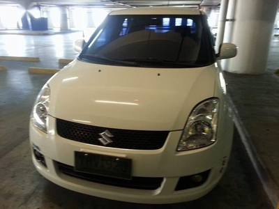 Sell White 2010 Suzuki Swift in Talisay