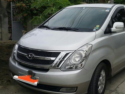 Selling Gold Hyundai Starex in Talisay