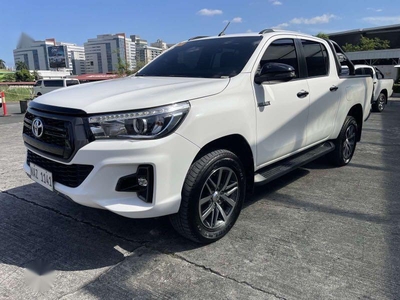 Pearl White Toyota Hilux 2018 for sale in Pasig