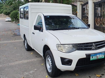Sell White 2013 Mitsubishi L200 in Quezon City