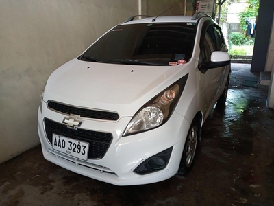 Pearl White Chevrolet Spark 2014 for sale in Manila