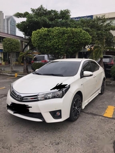 Selling Pearl White Toyota Corolla Altis 2015 in Bulacan