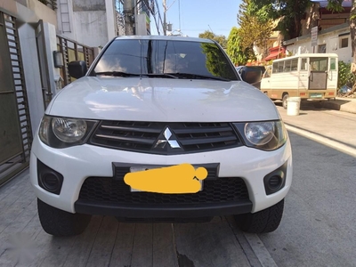 Sell White 2014 Mitsubishi Strada in Makati