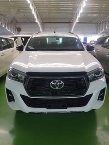 Selling White 2019 Toyota Hilux in Quezon City