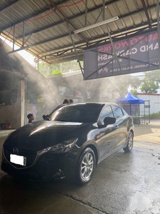 Selling White Mazda 2 2016 in Quezon City