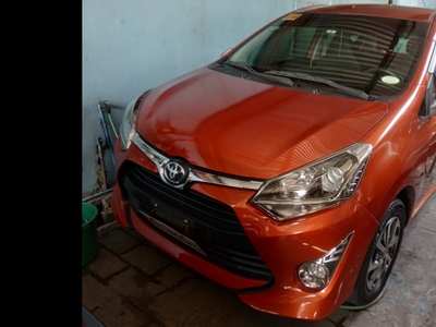 Yellow Toyota Wigo 2018 Hatchback at Automatic for sale in Quezon City