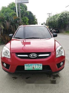 Red Kia Sportage 2010 for sale in Talisay