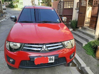 Sell Red 2014 Mitsubishi Strada at 92000 km