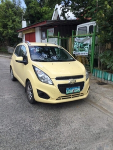 Yellow Chevrolet Spark 2013 Hatchback for sale in Manila