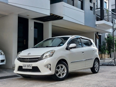Selling White Toyota Wigo 2015 in Quezon City