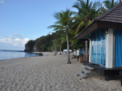 Lot for Sale with Exclusive Beach Access to a scenic beach front located at Laiya