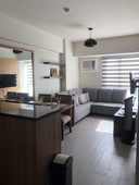 Modern 1 bedroom fully furnished condo unit with parking
