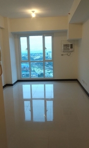FOR RENT AXIS RESIDENCES TOWER B STUDIO WITH AIRCON FACING BGC on Carousell