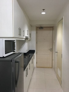 Fully furnished 1 bedroom condo unit with balcony for rent