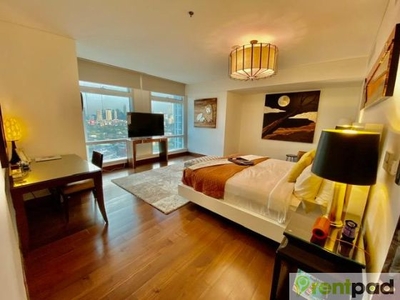 Fully Furnished 3 Bedroom Unit at Two Roxas Triangle for Rent