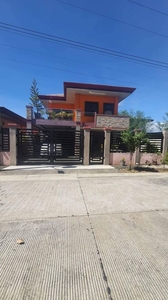 furnished two storey house and lot in hacienda subdivision, catalunan pequeño