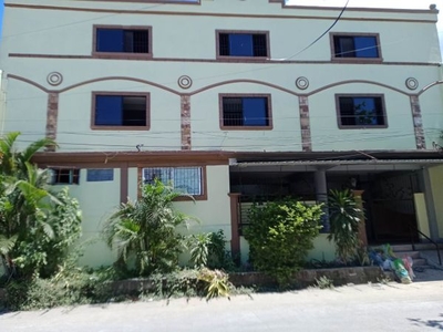 A three storey school building and lot for sale