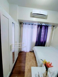 Fully Furnished 1BR with Balcony facing pool at Air Residences by SMDC Makati