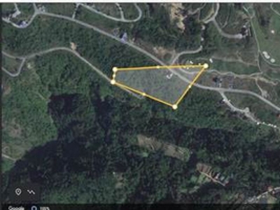Prime lot For Sale adjacent to Pinewoods