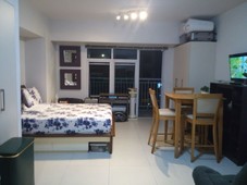 Fully furnished Condo Unit For Rent and Sale on the 19th floor with spacious balcony facing SM Aura with nice view