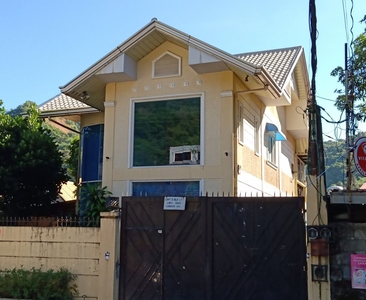 A 2- storey single-family house with 2 apartments in its basement.