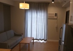 FULLY FURNISHED ONE BEDROOM Corner unit with balcony